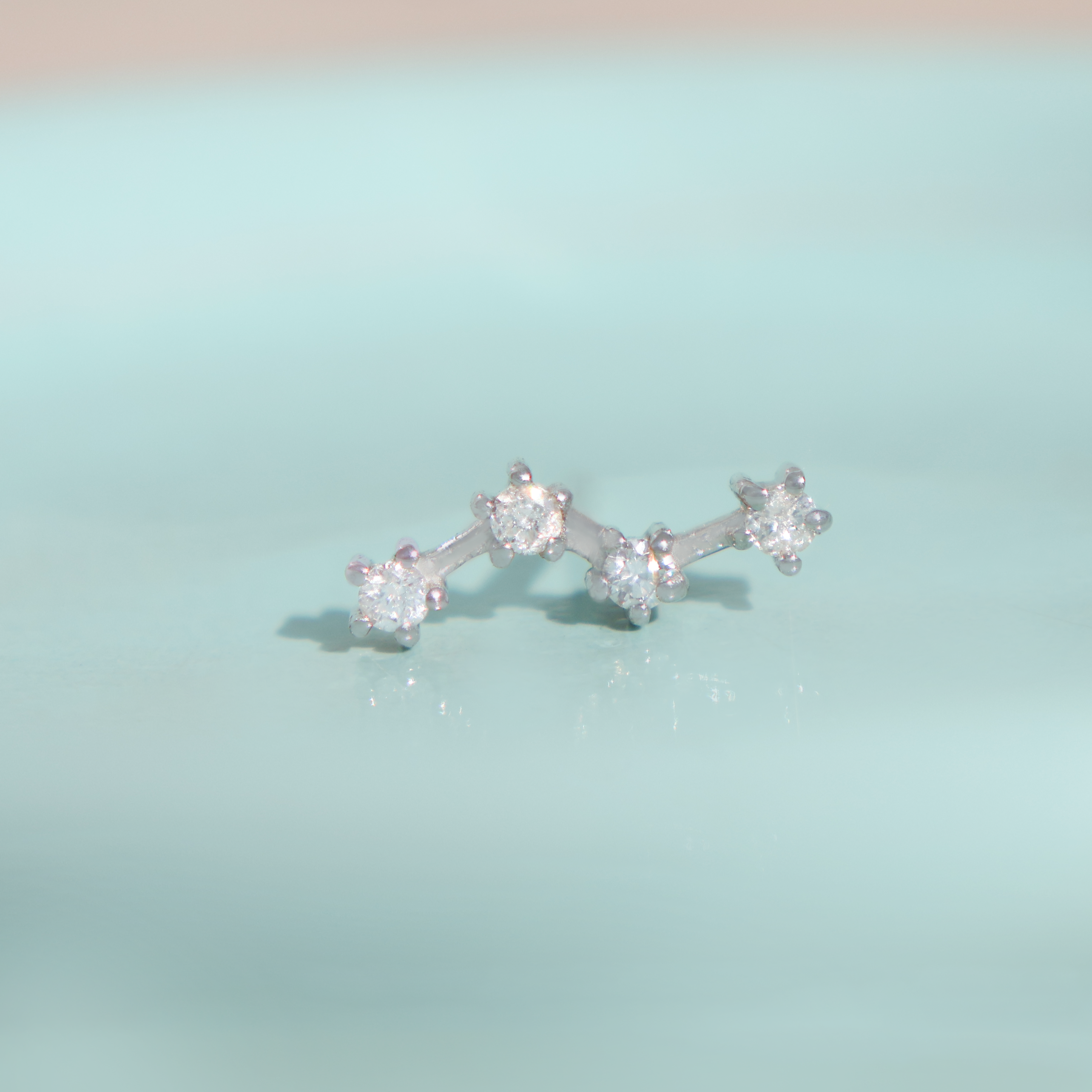 Piercing Ursa Diamantes